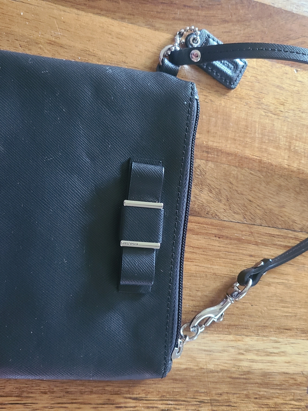Black Coach Wristlet with Bow Accent